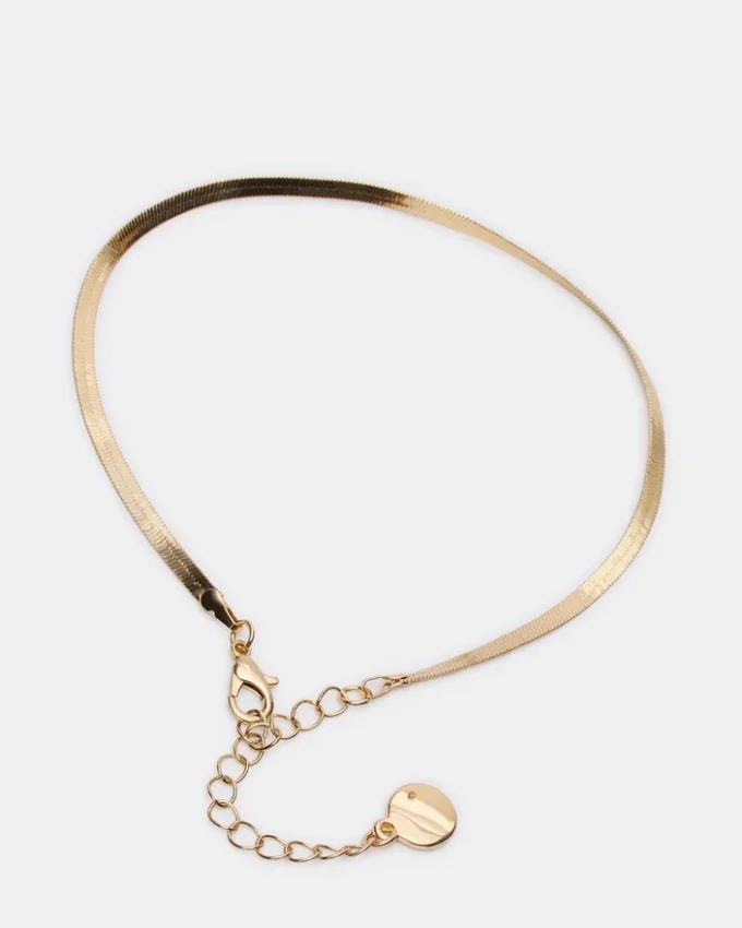 Ankelkjedesett i gull med fiskebeinmønster