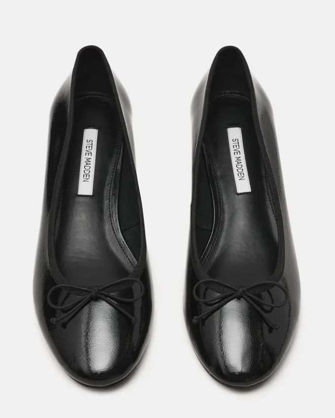 Klutzy svart lakkskinn