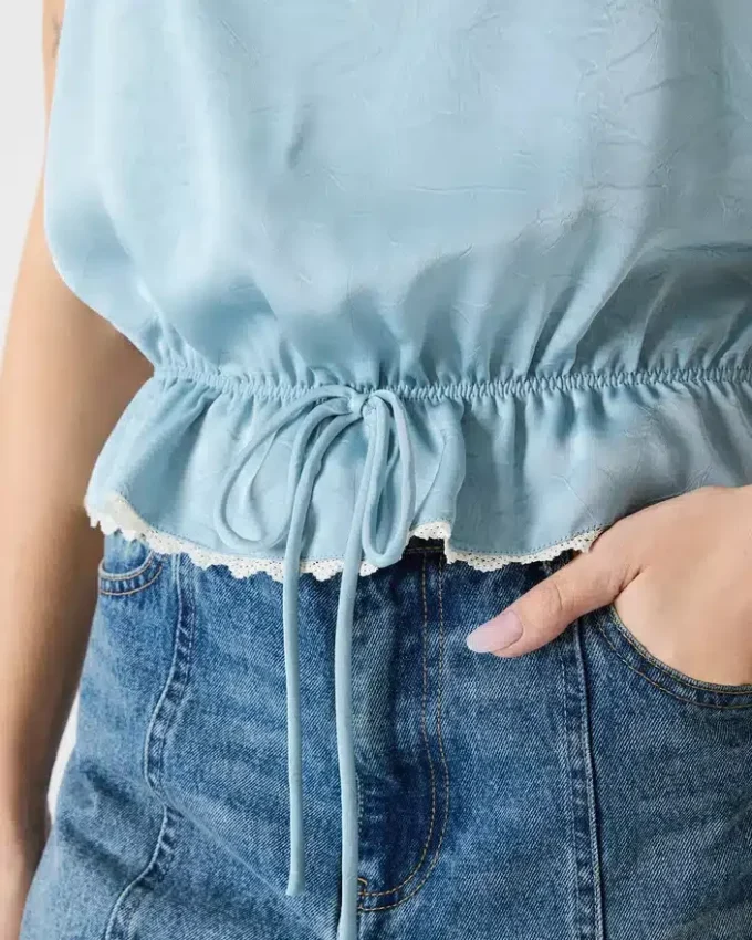 Roan-top i støvblått