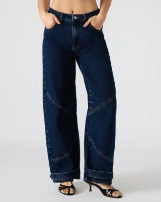 Tre mørkvaskede jeans
