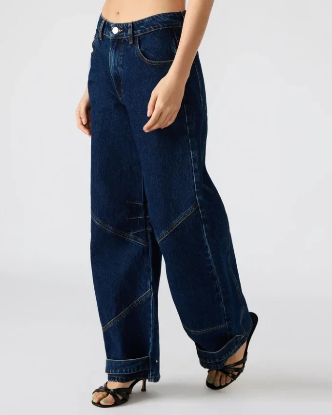 Tre mørkvaskede jeans