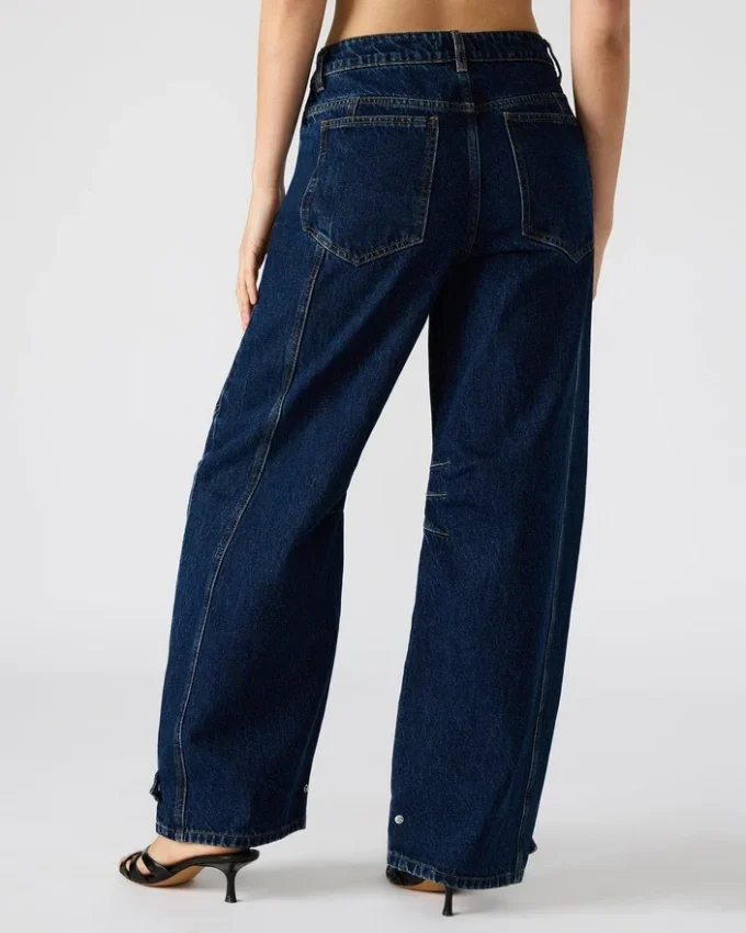 Tre mørkvaskede jeans