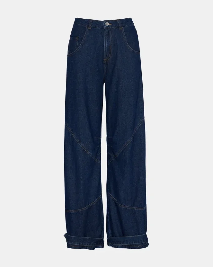 Tre mørkvaskede jeans